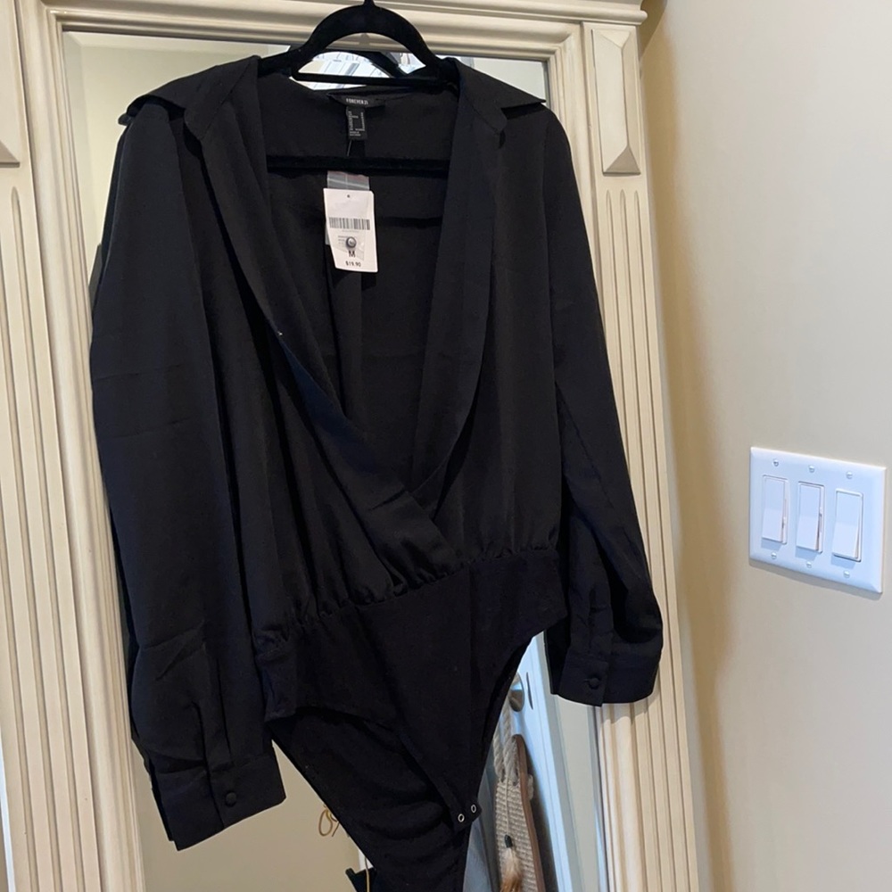 Black open body suit